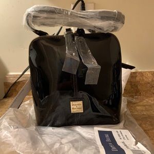 Hello I have a brand new Dooney & Bourke Bag in perfect condition!
